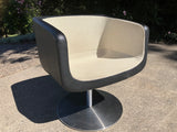 Retro tub chairs by Shamburg and Alvisse, classic black leather, stainless base and white material seat - Marlborough Antiques